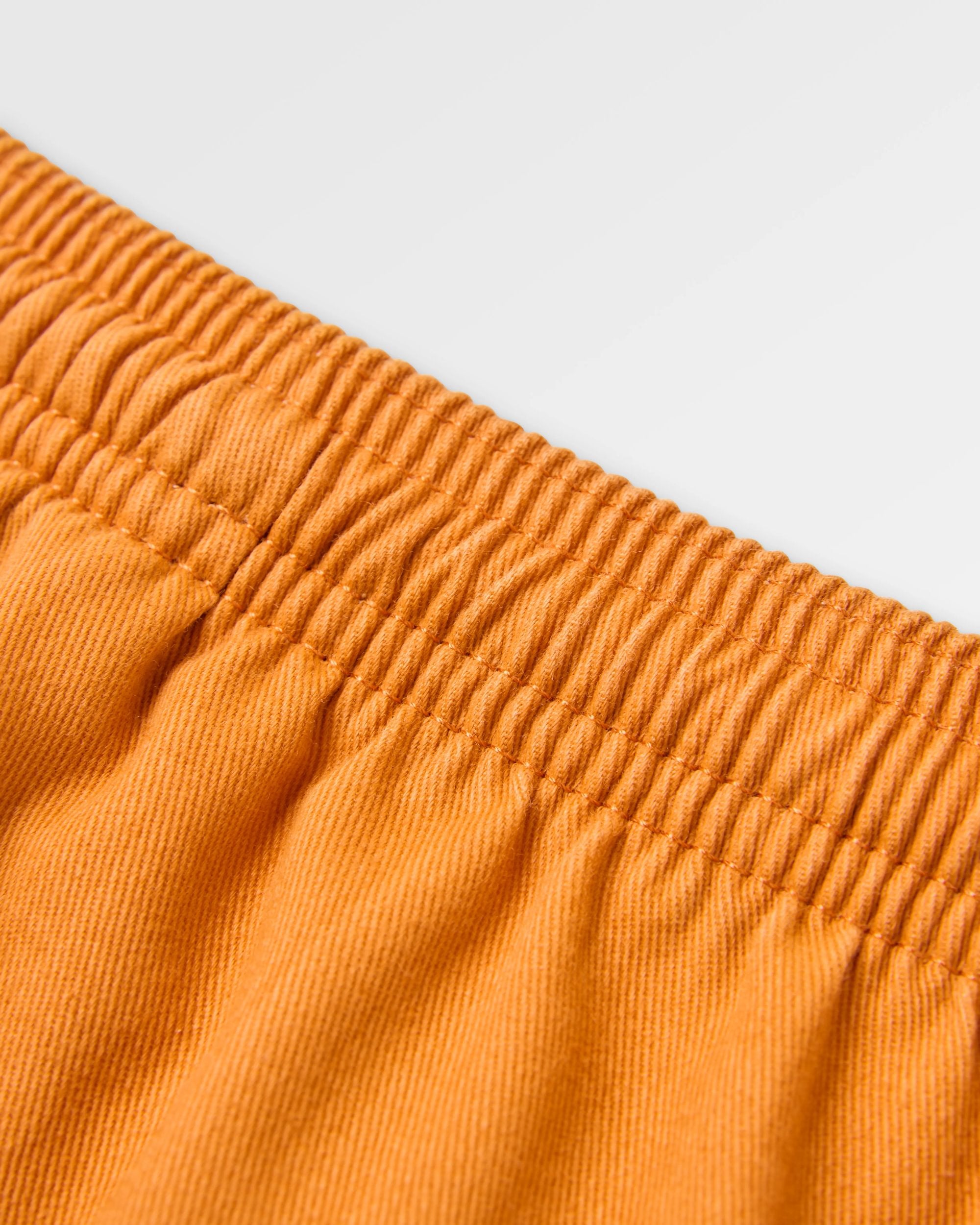 Flaris All Purpose Short - Sunrise Orange - Flatlay