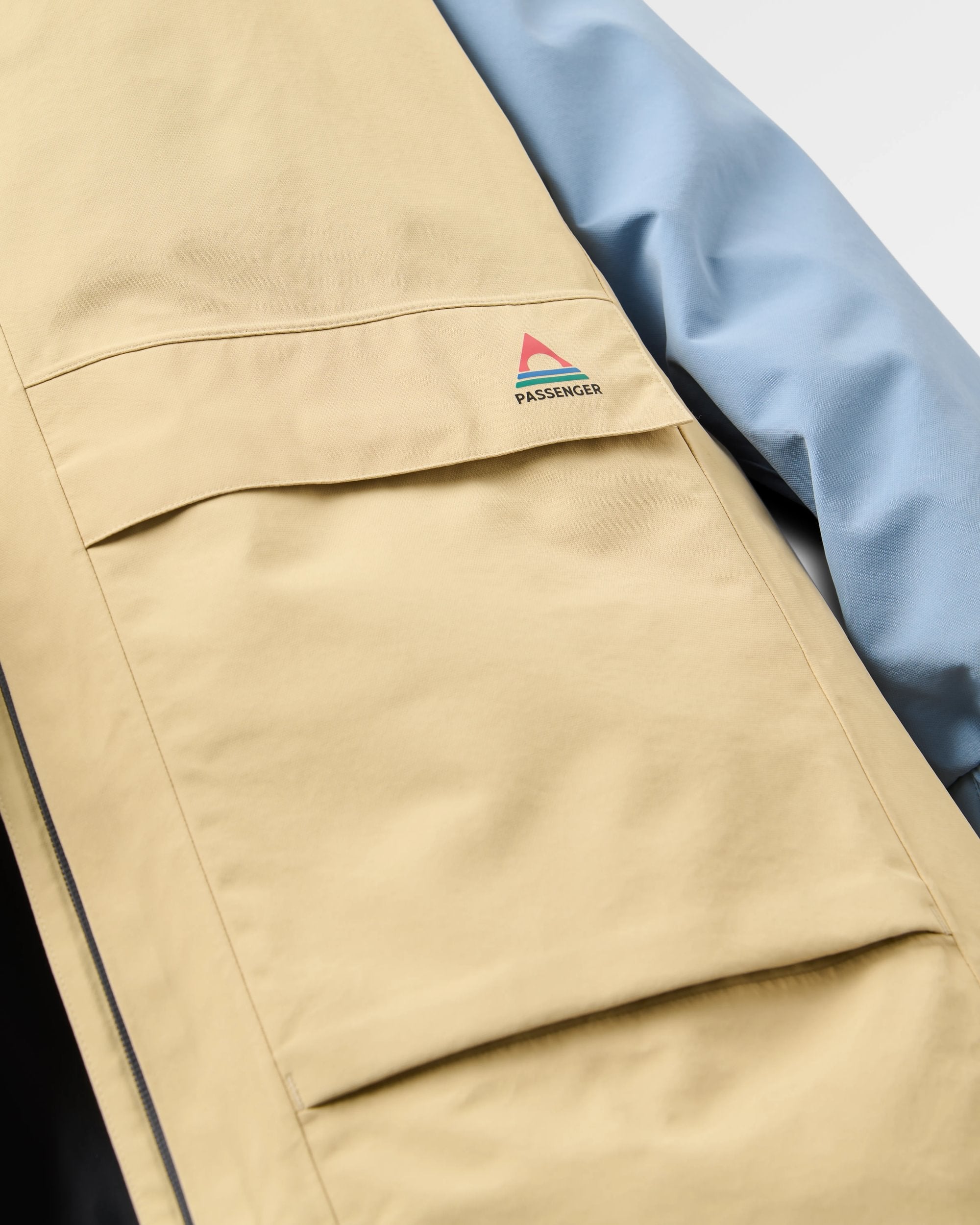 Serein Waterproof Jacket - Faded Denim/Desert - Flatlay