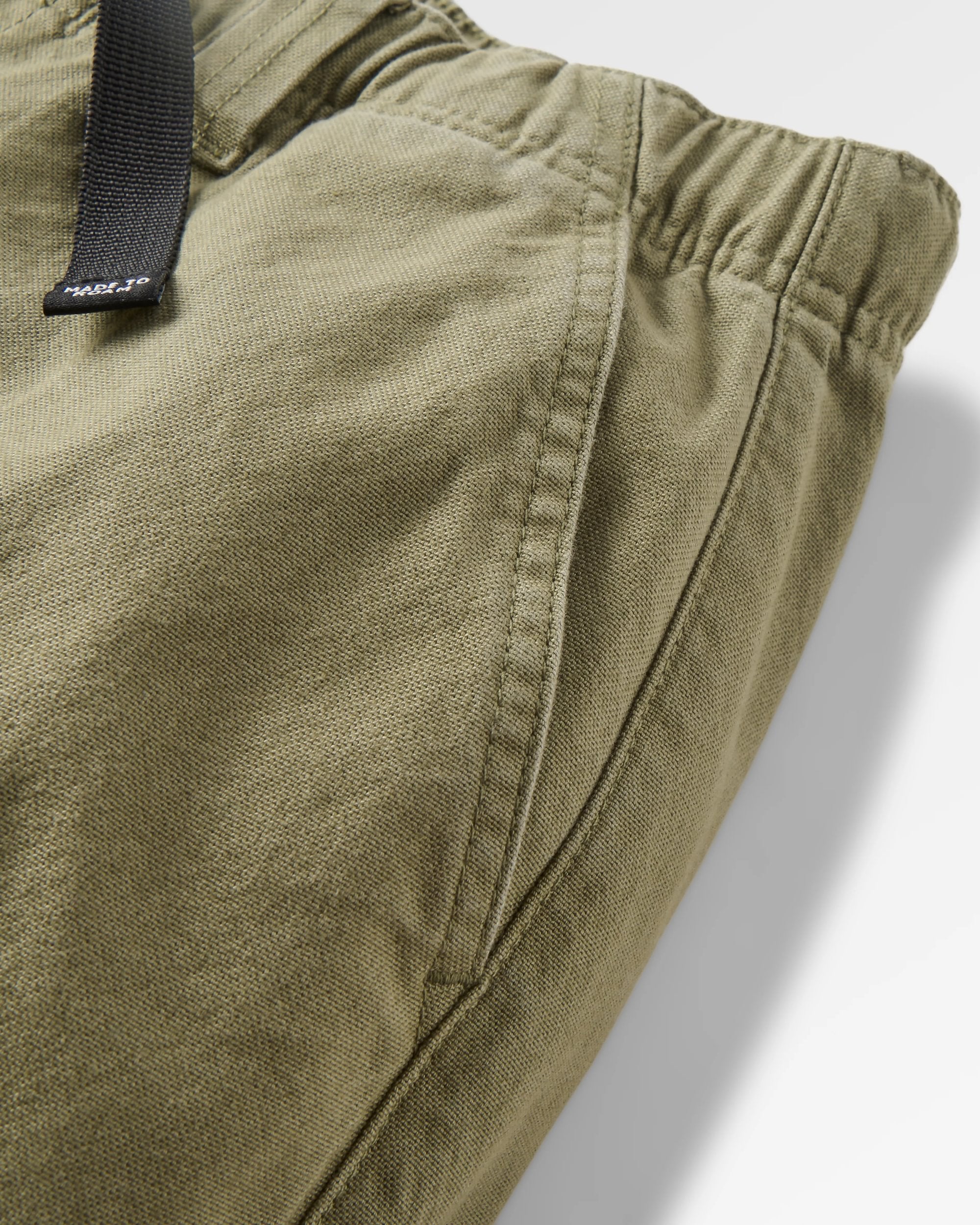 Adventurer Organic Canvas Trouser - Dusty Olive - Flatlay