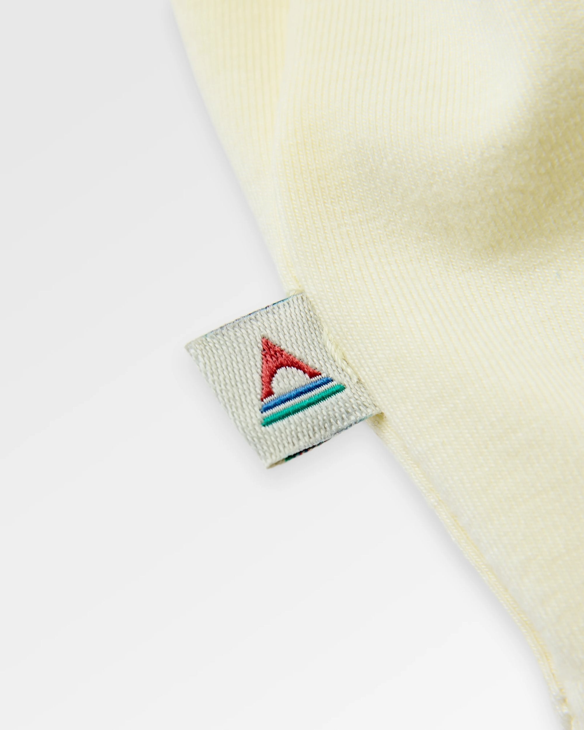Chase The Light Drirelease® Active LS T-Shirt - Pale Yellow - Flatlay